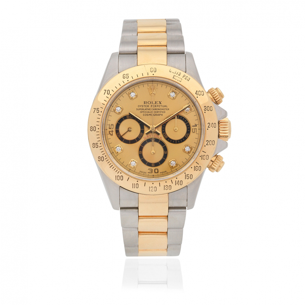Rolex. A stainless steel and 18K gold automatic chronograph bracelet watch with diamond set dial