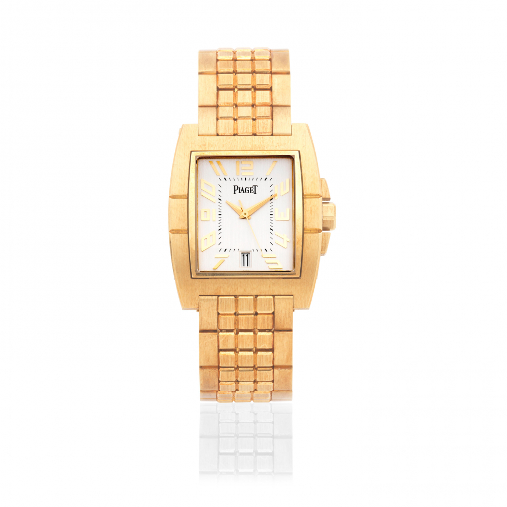 Piaget. An 18K gold automatic calendar bracelet watch