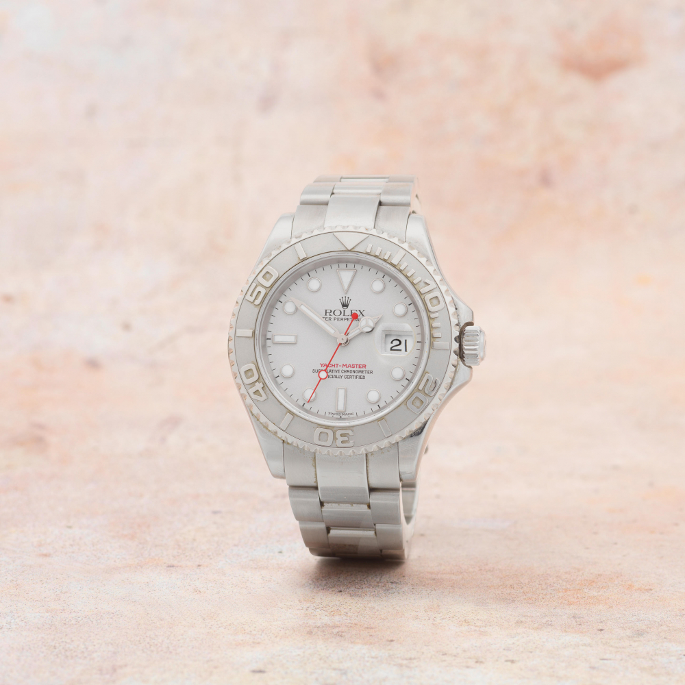Rolex. A stainless steel and platinum automatic calendar bracelet watch