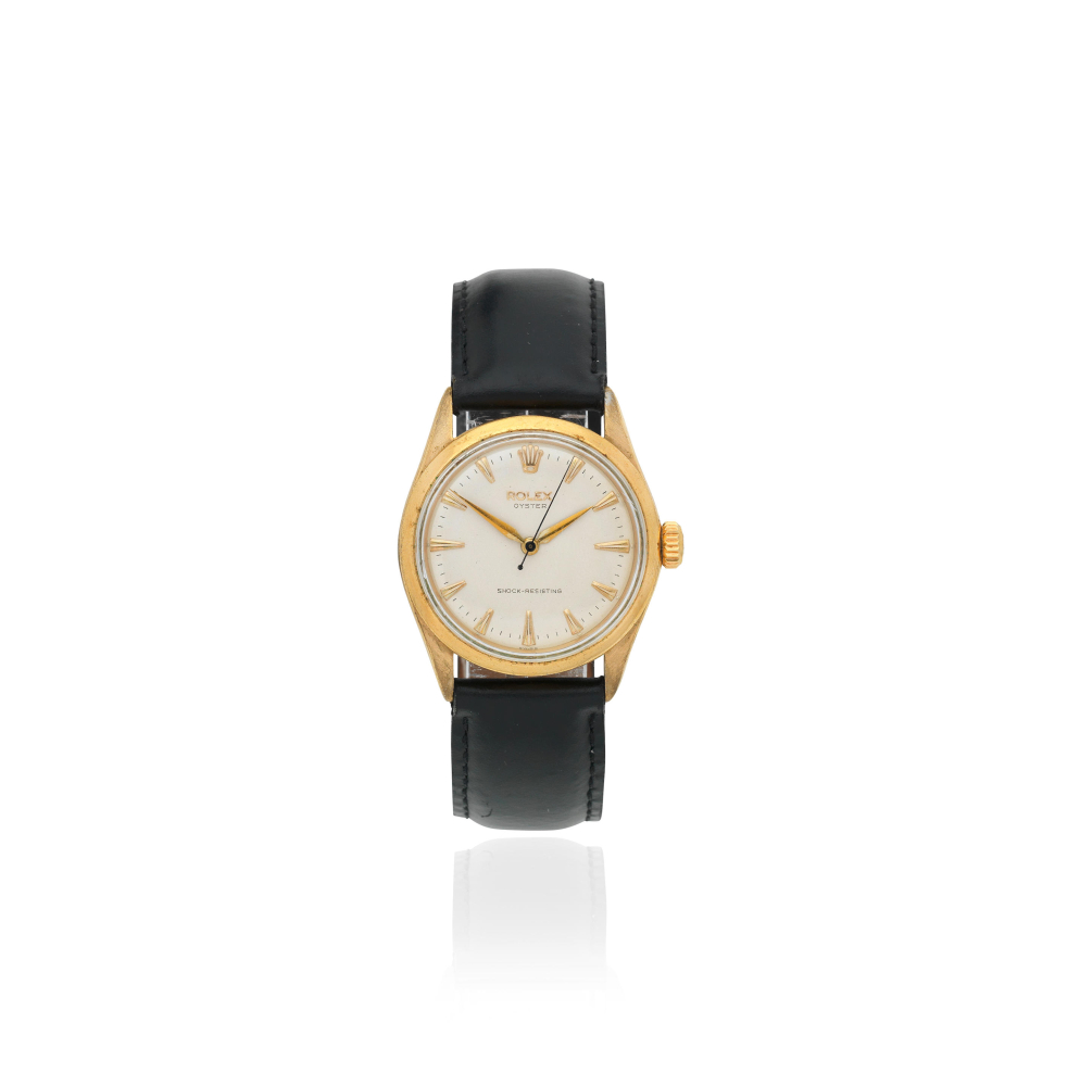 Rolex. A stainless steel gold plated manual wind wristwatch