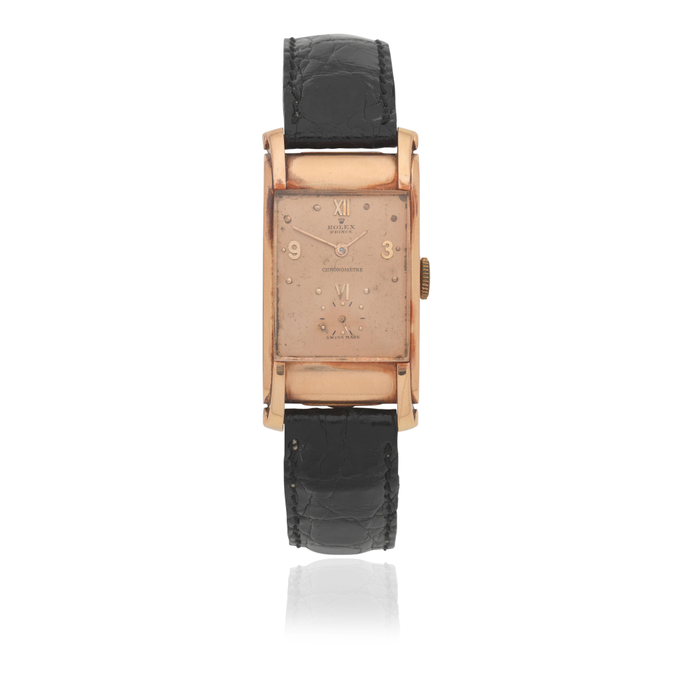 Rolex. An 18K rose gold manual wind wristwatch