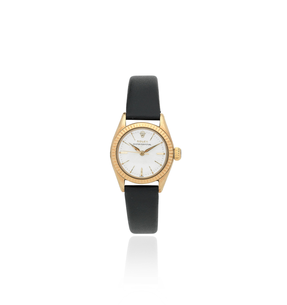 Rolex. A lady's 9K gold automatic wristwatch