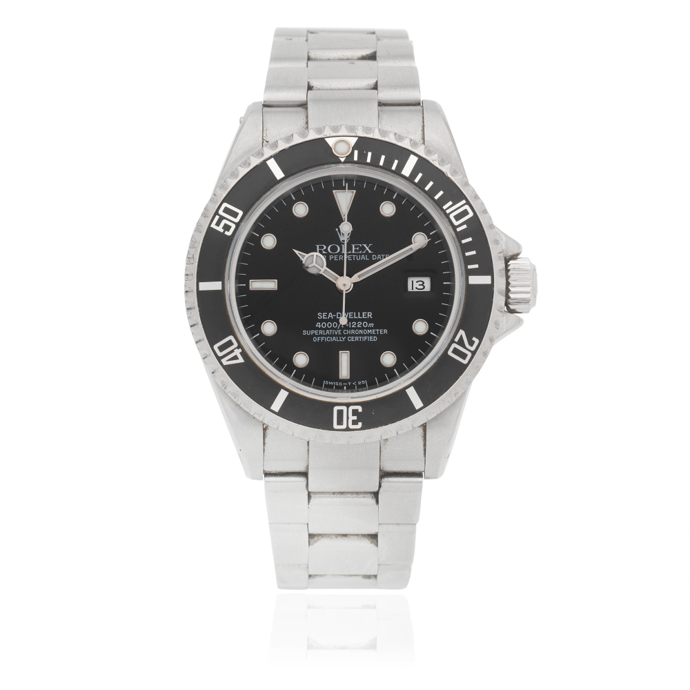 Rolex. A stainless steel automatic calendar bracelet watch