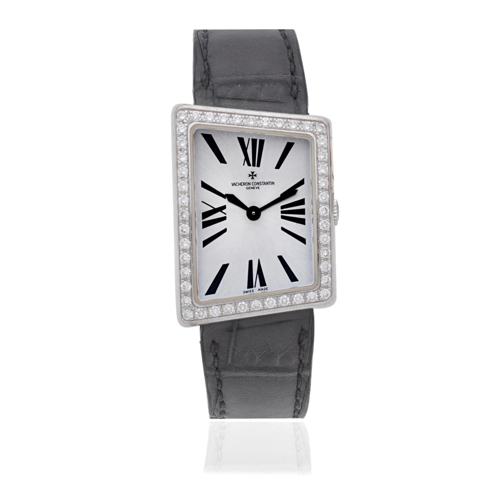 Vacheron Constantin. A lady's asymmetrical 18K white gold diamond set quartz wristwatch