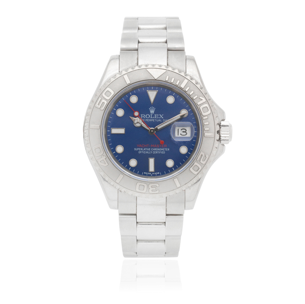 Rolex. A stainless steel and platinum automatic calendar bracelet watch