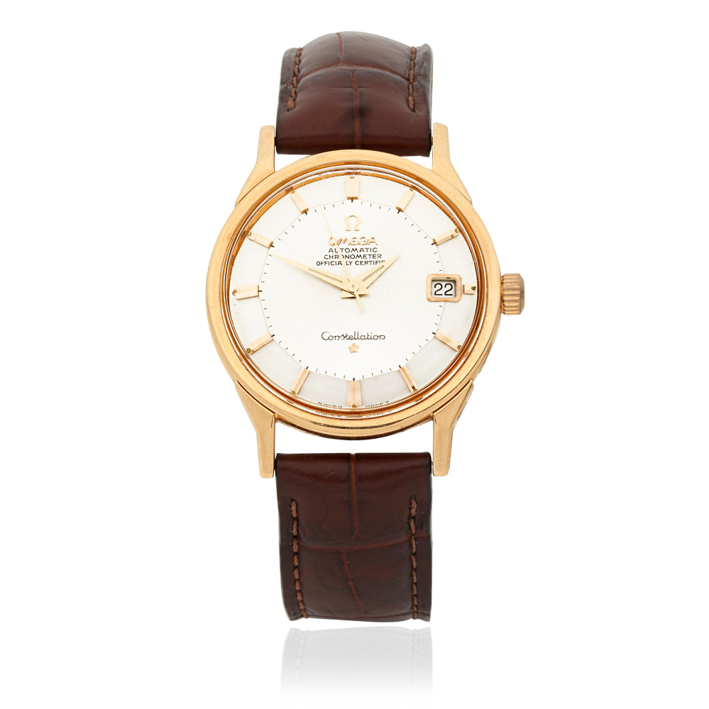 Omega. An 18K rose gold automatic calendar wristwatch with pie-pan dial