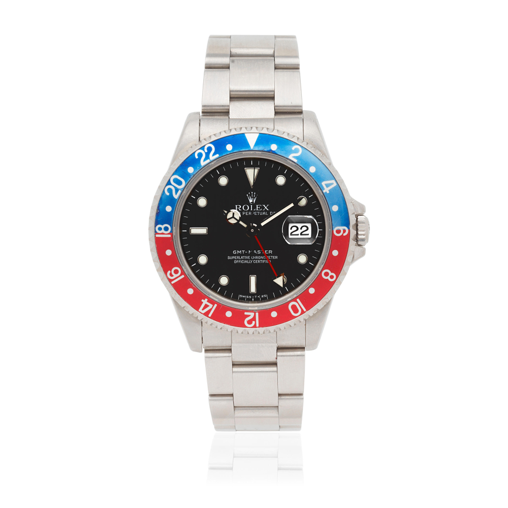 Rolex. A stainless steel automatic calendar bracelet watch with dual time zone
