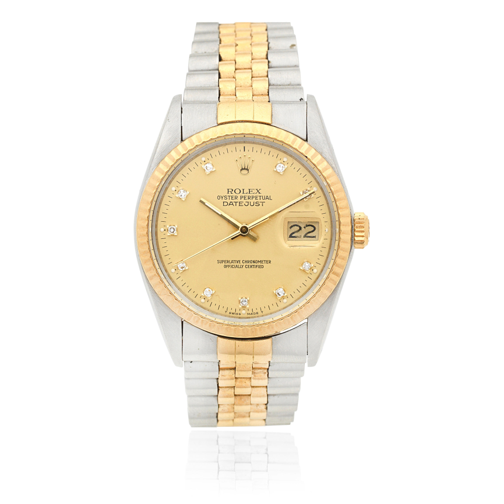 Rolex. A stainless steel and gold diamond set automatic calendar bracelet watch