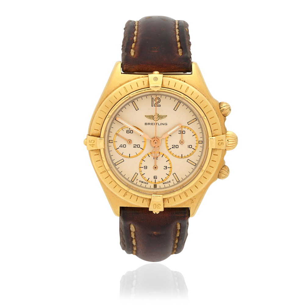Breitling. An 18K gold manual wind chronograph wristwatch