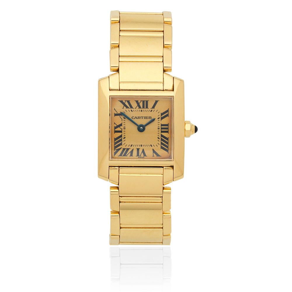 Cartier. A lady's 18K gold quartz bracelet watch