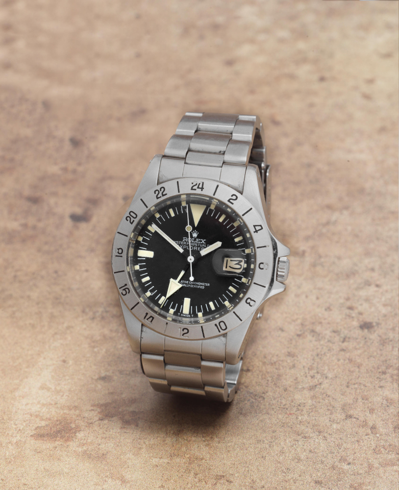 Rolex. A stainless steel automatic calendar bracelet watch with dual time zone
