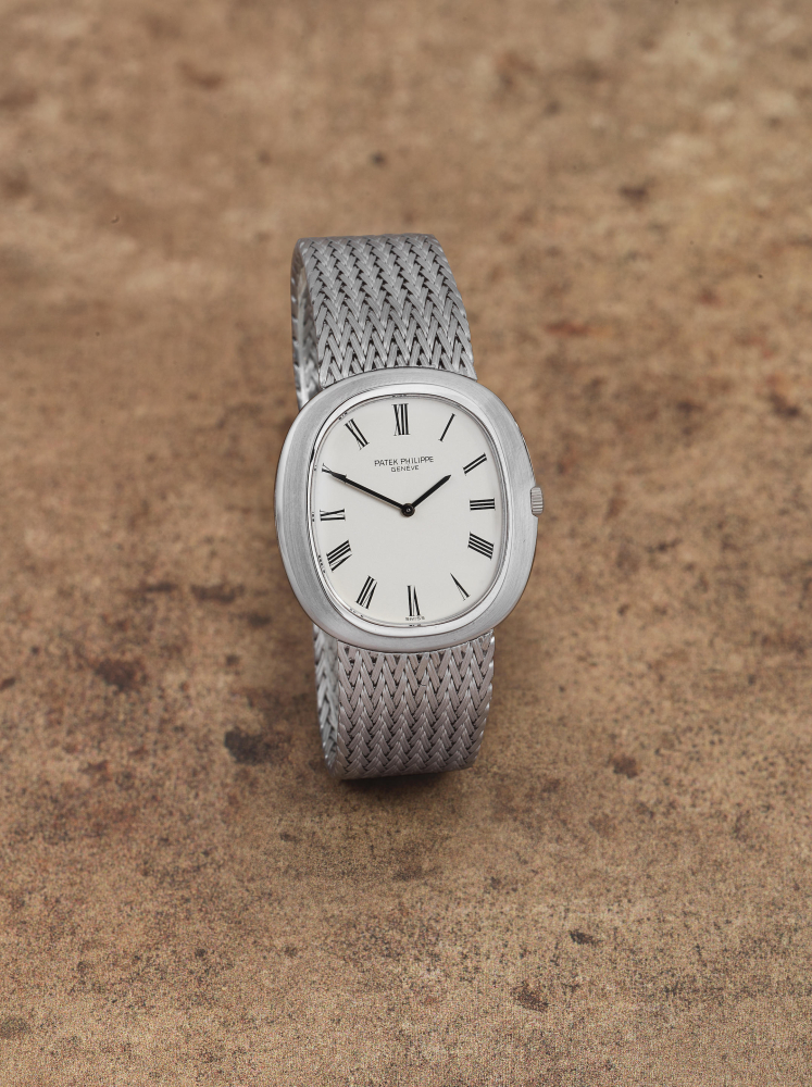 Patek Philippe. An 18K white gold automatic bracelet watch