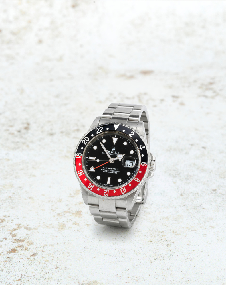 Rolex. A fine stainless steel automatic calendar bracelet watch with dual time zone