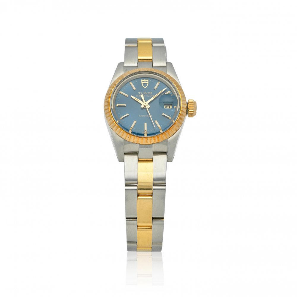 TUDOR. A LADY'S STAINLESS STEEL AND GOLD CALENDAR BRACELET WATCH