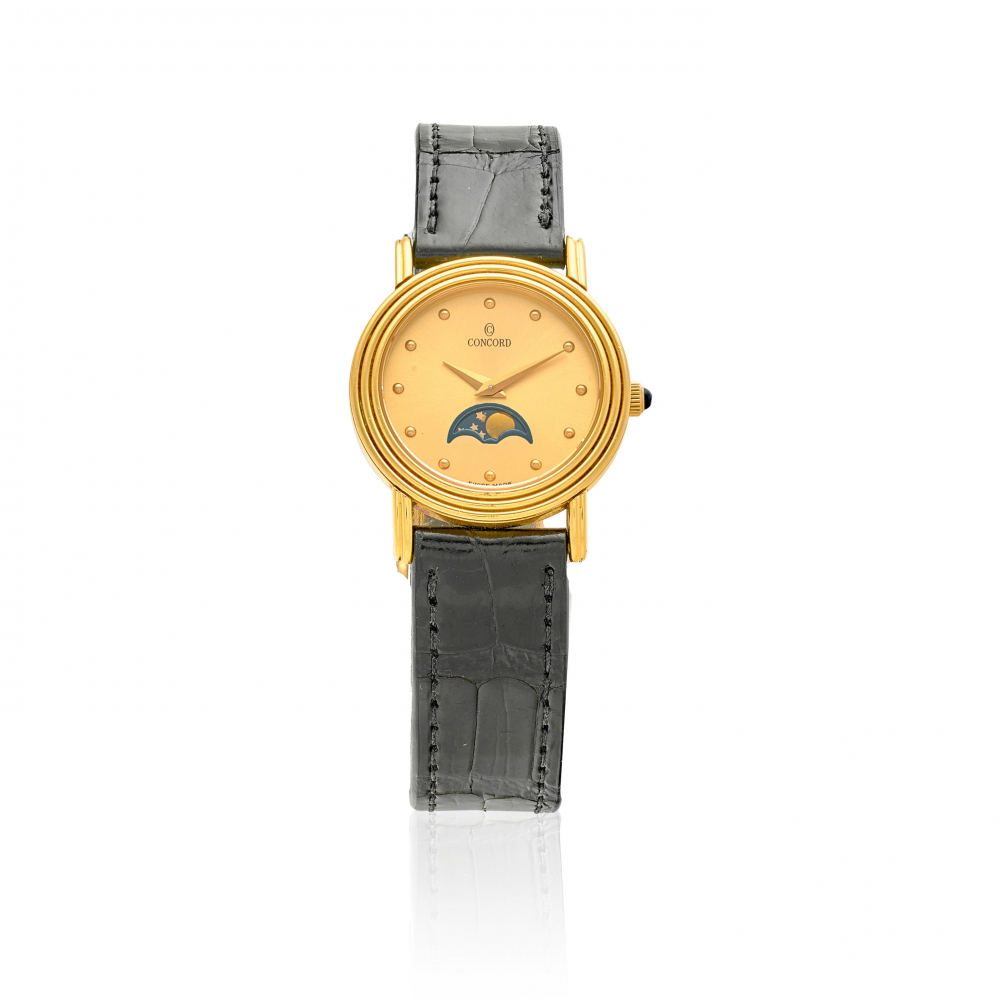 CONCORD. A LADY'S 18K GOLD WRISTWATCH WITH MOON PHASE