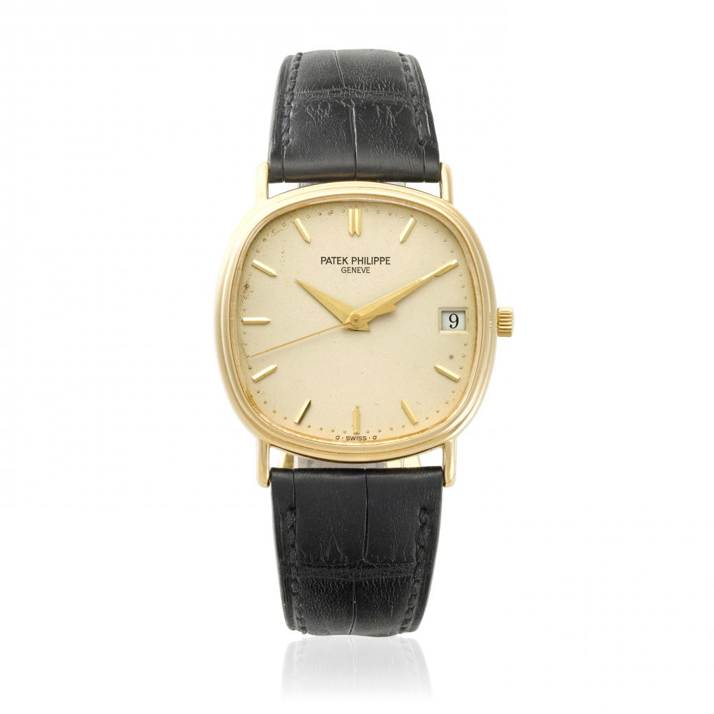 PATEK PHILIPPE. AN 18K AUTOMATIC CALENDAR WRISTWATCH