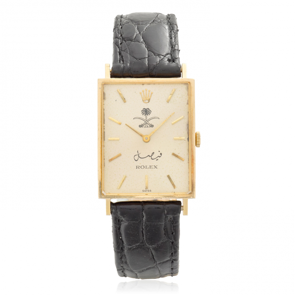ROLEX. AN 18K GOLD MANUAL WIND RECTANGULAR WRISTWATCH WITH SIGNATURE OF KING FAISAL OF SAUDI ARABIA