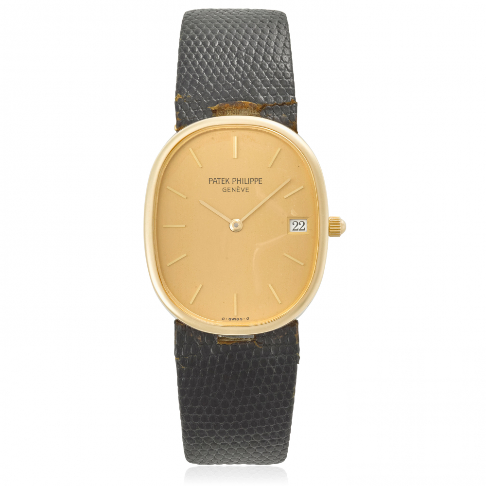 PATEK PHILIPPE. AN 18K GOLD CALENDAR WRISTWATCH