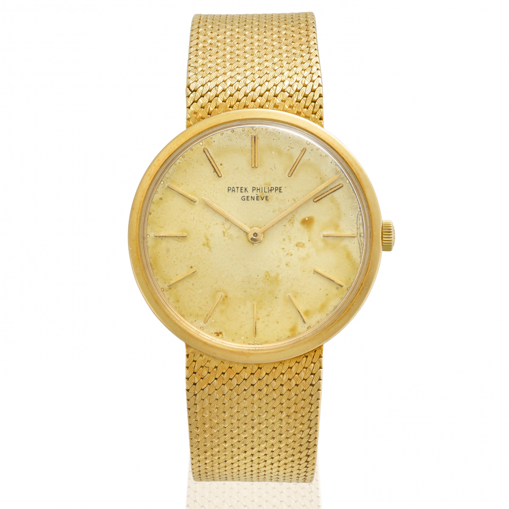 PATEK PHILIPPE. AN 18K GOLD BRACELET WATCH