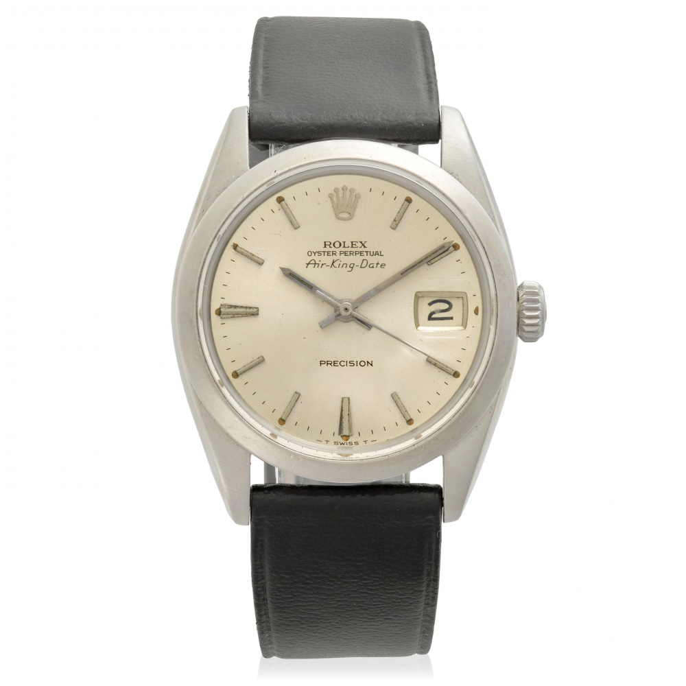 ROLEX. A STAINLESS STEEL AUTOMATIC CALENDAR WRISTWATCH