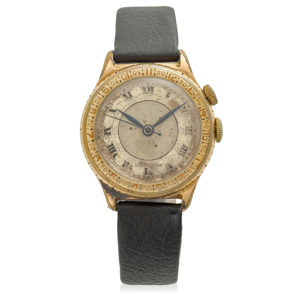 LONGINES. A 10K GOLD FILLED MANUAL WIND PILOTS WATCH