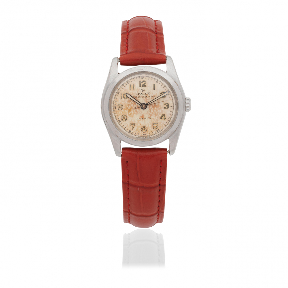 Rolex. A stainless steel manual wind wristwatch