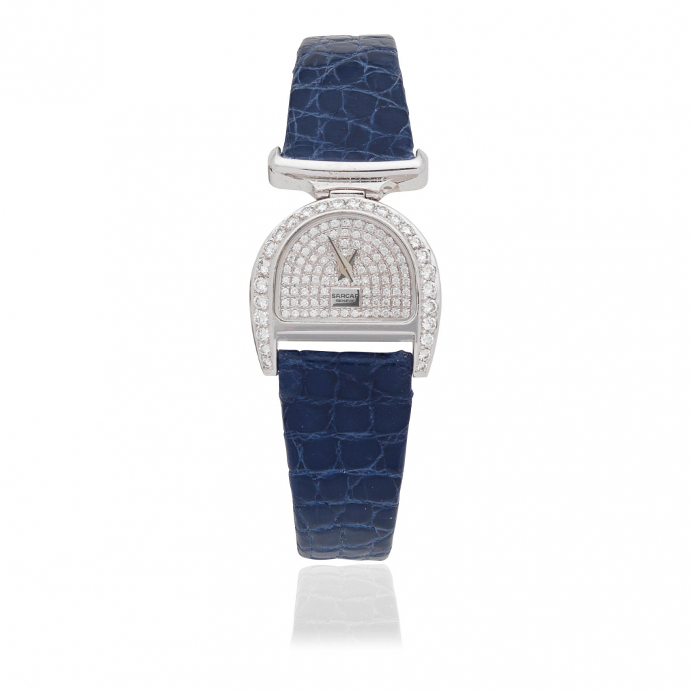 Sarcar. A lady's 18K white gold and diamond set quartz wristwatch