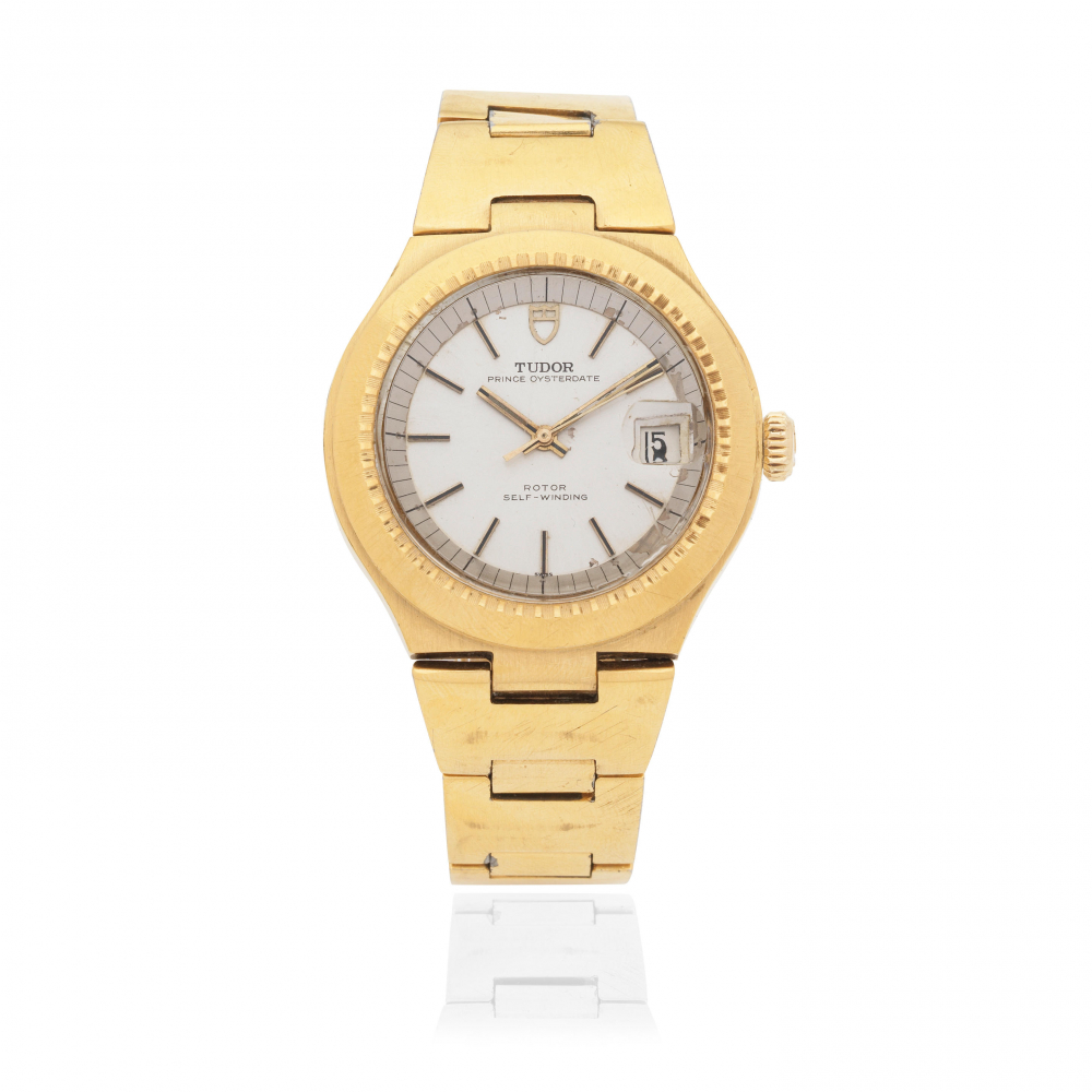 Tudor. A gold plated and stainless steel automatic calendar bracelet watch