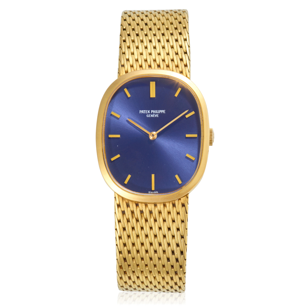 PATEK PHILIPPE. AN 18K GOLD MANUAL WINDING BRACELET WATCH