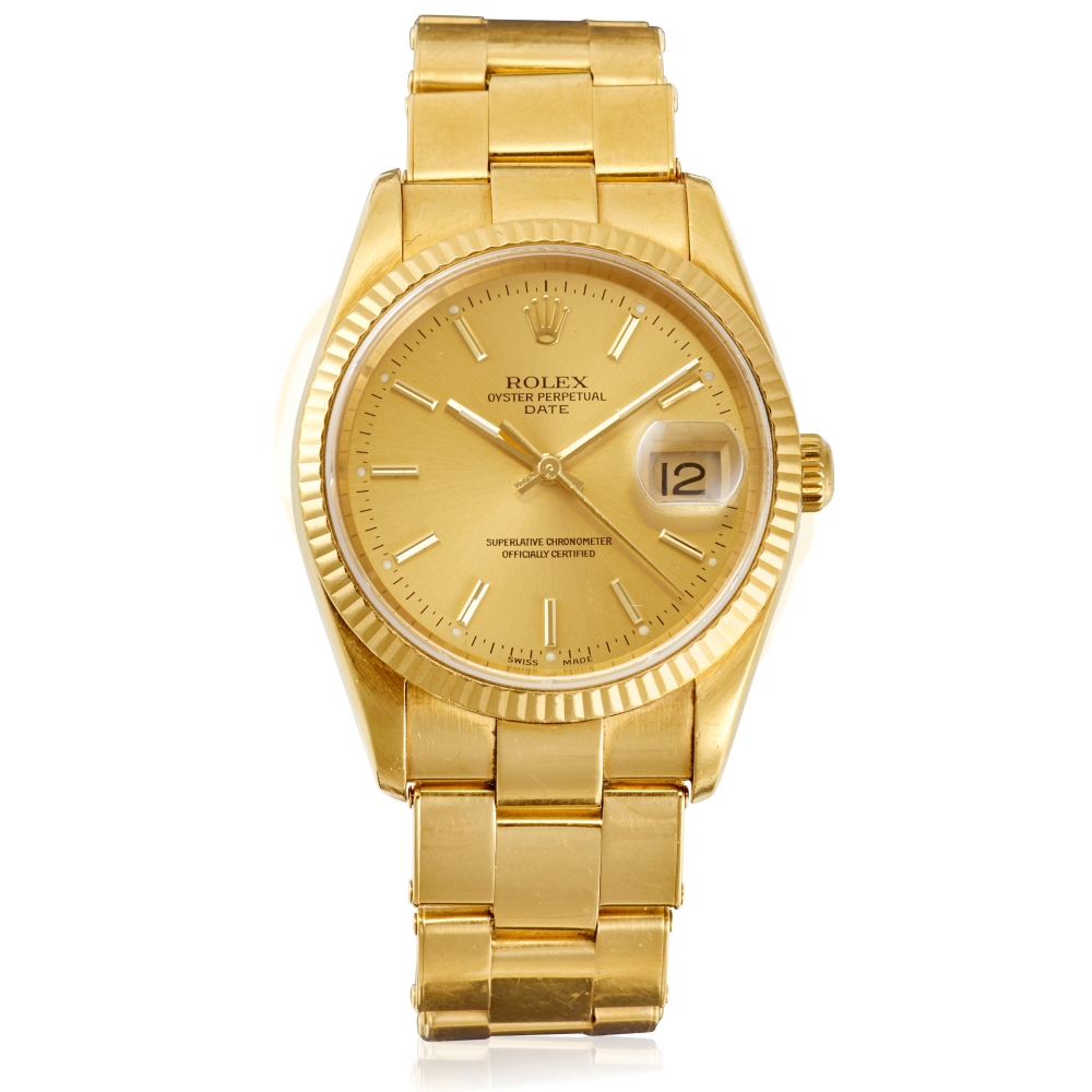 ROLEX. AN 18K GOLD AUTOMATIC CALENDAR BRACELET WATCH