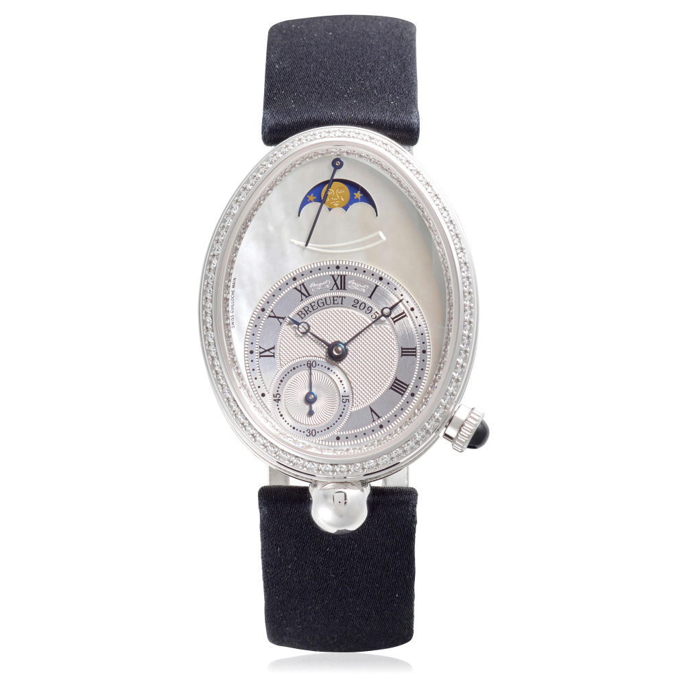 BREGUET. A FINE 18K WHITE GOLD AND DIAMOND AUTOMATIC WRISTWATCH WITH MOON PHASE AND POWER RESERVE INDICATION