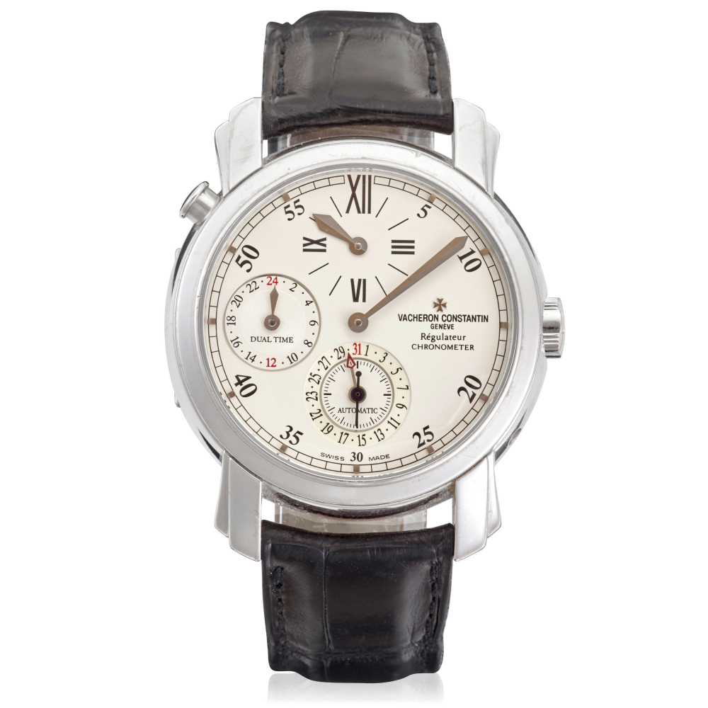 VACHERON CONSTANTIN. AN 18K WHITE GOLD AUTOMATIC DUAL TIME REGULATOR CALENDAR WRISTWATCH