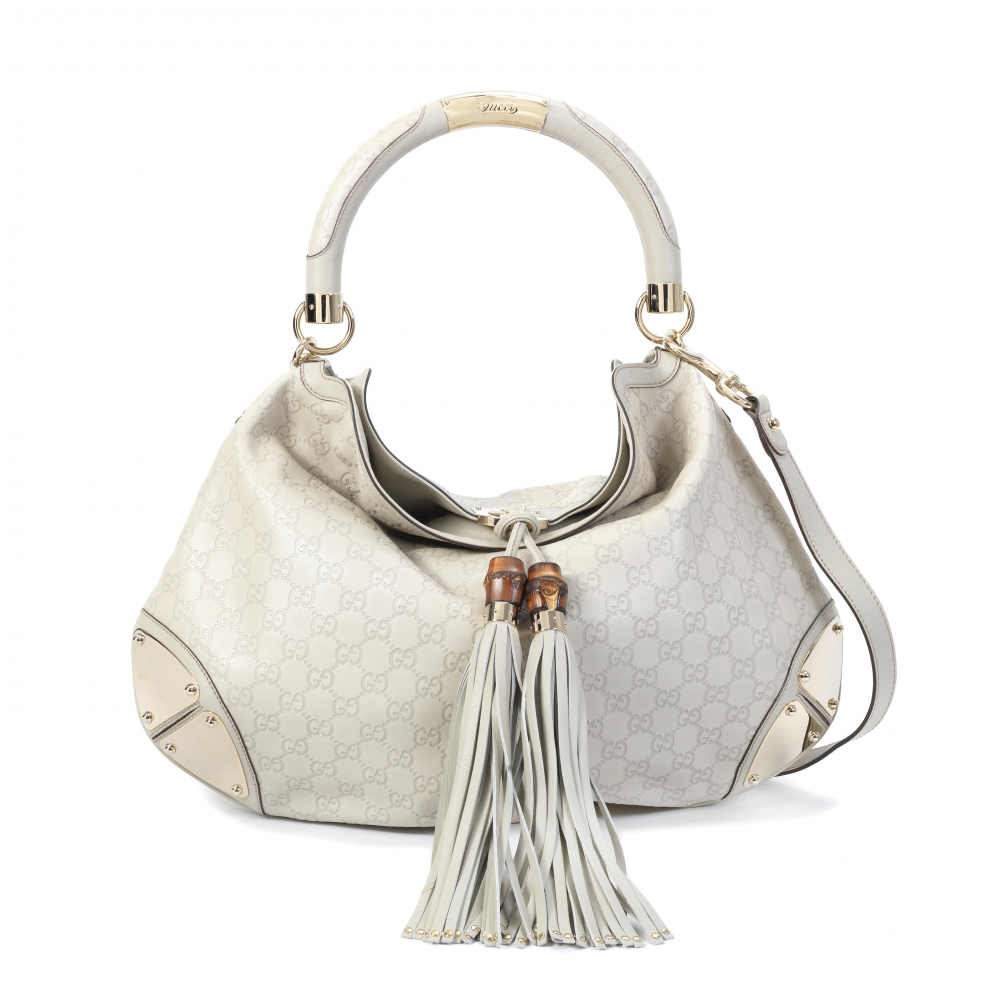 Gucci: a Large Guccissima Ivory Leather Indy Hobo Bag