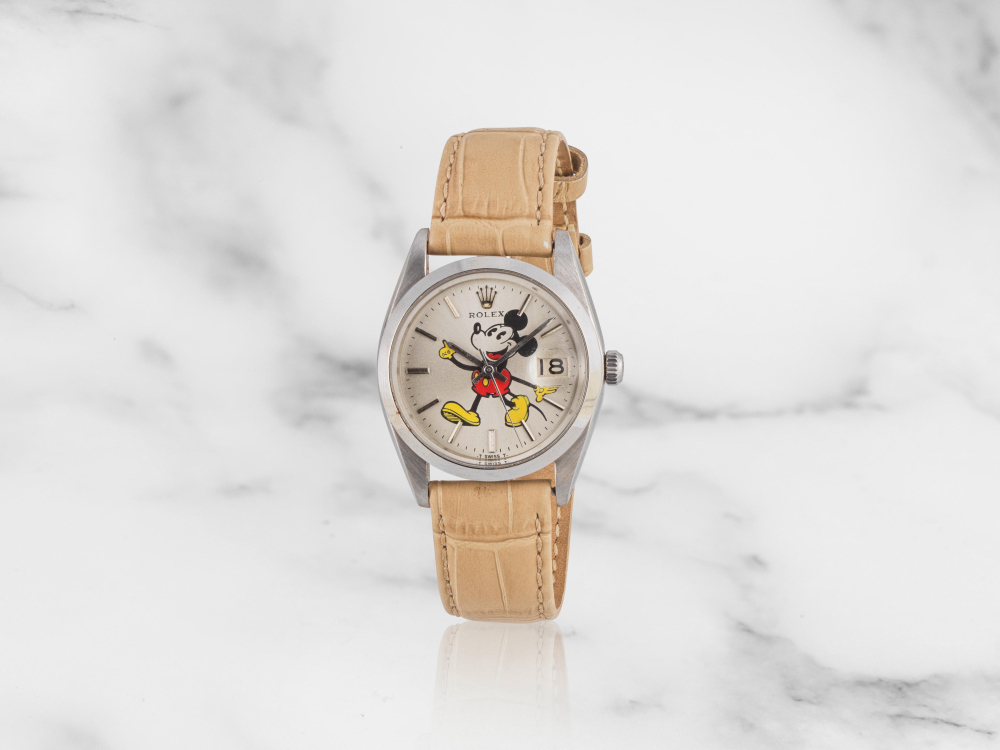 Rolex. Montre bracelet en acier avec date et cadran customisé représentant Mickey Mouse mouvement mécanique