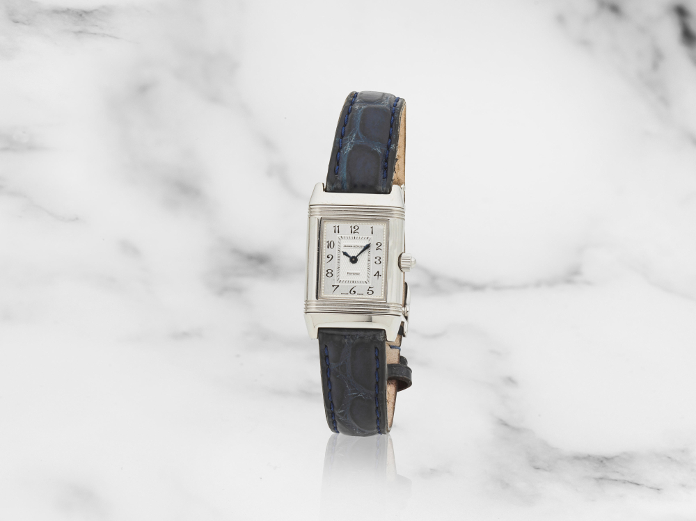 Jaeger-LeCoultre. Montre bracelet en acier rectangulaire et réversible à double cadran sertie de diamants mouvement mécanique