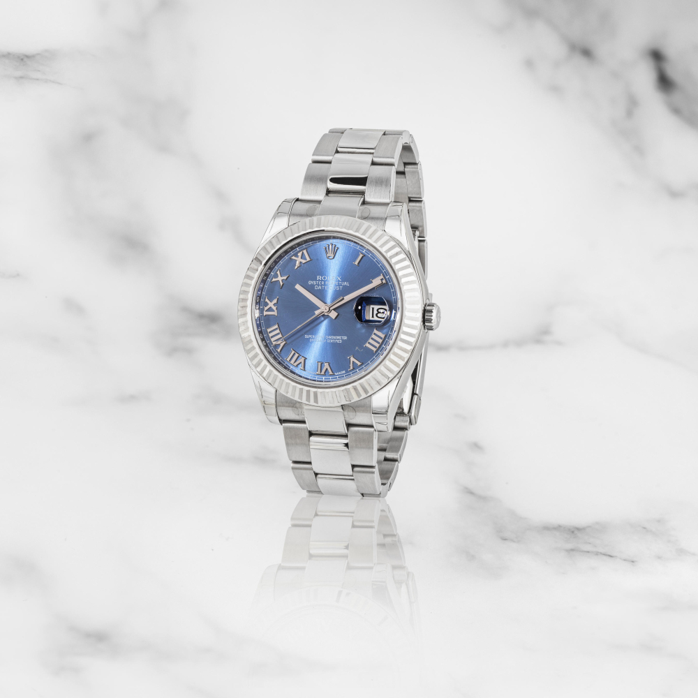 Rolex. Montre bracelet en or blanc 18K (750) et acier avec date mouvement automatique