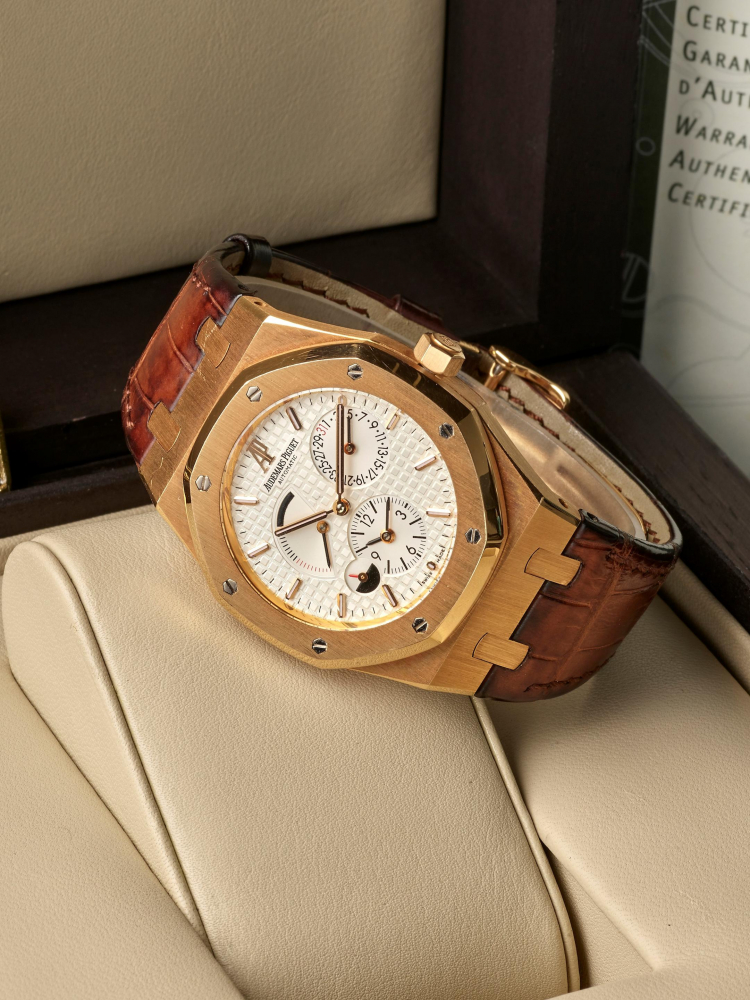 AUDEMARS PIGUET | ROYAL OAK - DUAL TIME, REF.26120OR, A FINE PINK GOLD TWO TIME ZONE WRISTWATCH WITH POWER RESERVE INDICATOR, DAY/NIGHT INDICATION AND DATE, CIRCA 2009