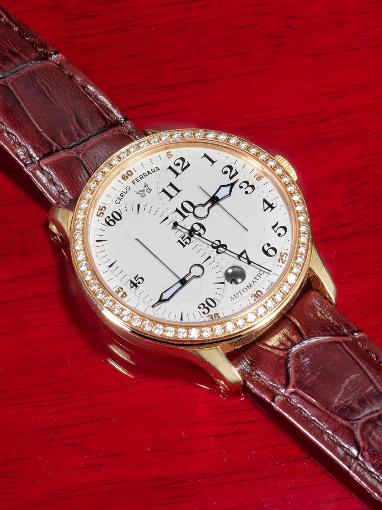 CARLO FERRARA | REGOLATORE, REF.RM MCMXCVII, A RARE LIMITED EDITION PINK GOLD AND DIAMOND-SET WRISTWATCH WITH DATE, CIRCA 2001