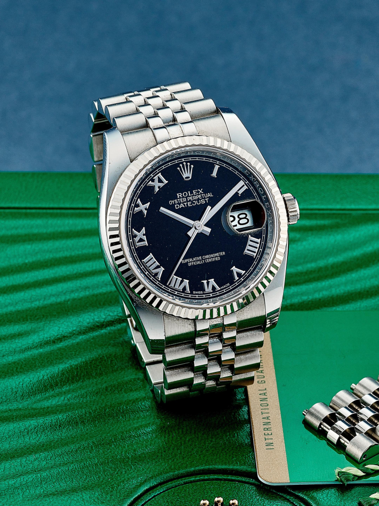 ROLEX | DATEJUST, REF.116234, A STAINLESS STEEL BRACELET WATCH WITH WHITE GOLD BEZEL AND DATE, CIRCA 2018