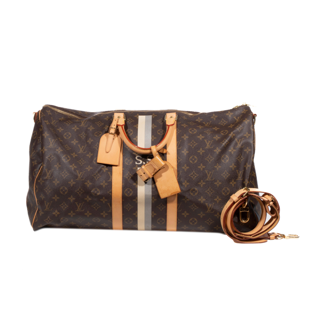 Louis VUITTON, année 2012. Sac "KeepAll" 55 c en toile Monogram et cuir naturel