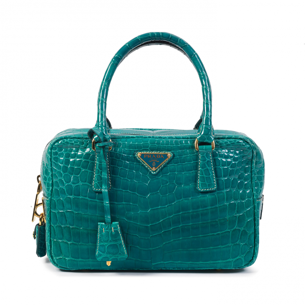 Prada: a Turquoise Crocodile Bauletto Top Handle Bag