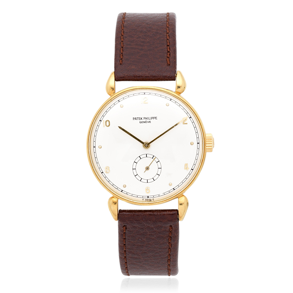 Patek Philippe. An 18K gold manual wind wristwatch