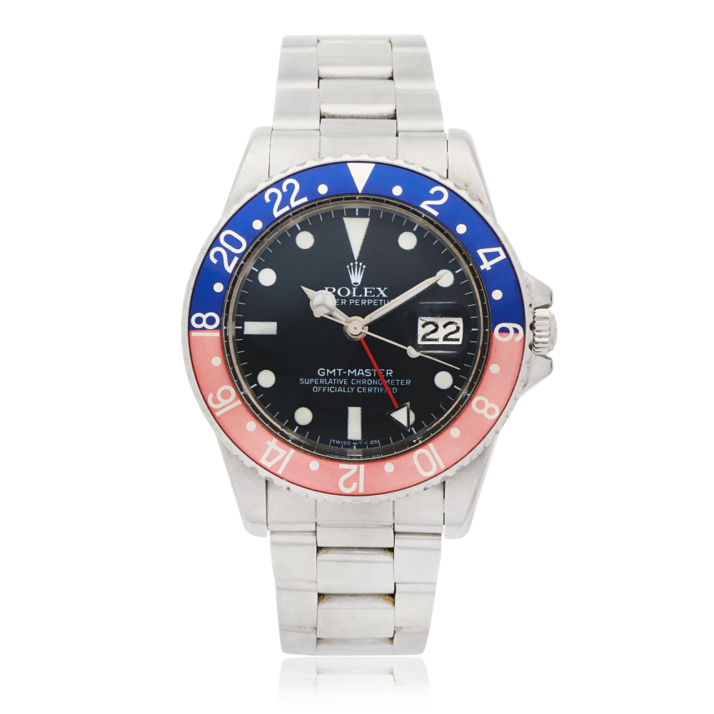 Rolex. A stainless steel automatic calendar bracelet watch with dual time zone