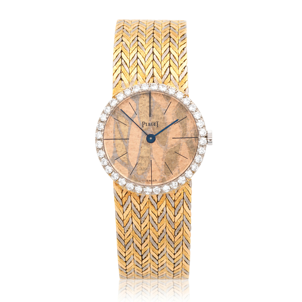 Piaget. A lady's three colour 18K gold diamond set manual wind bracelet watch