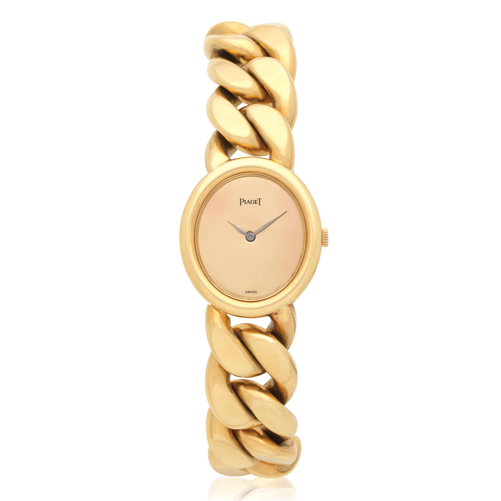 Piaget. A lady's 18K gold manual wind bracelet watch