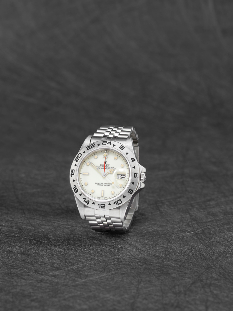 Rolex. A fine and rare stainless steel automatic calendar bracelet watch with panna rail dial