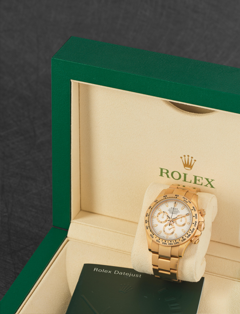 Rolex. A fine 18K rose gold automatic chronograph bracelet watch