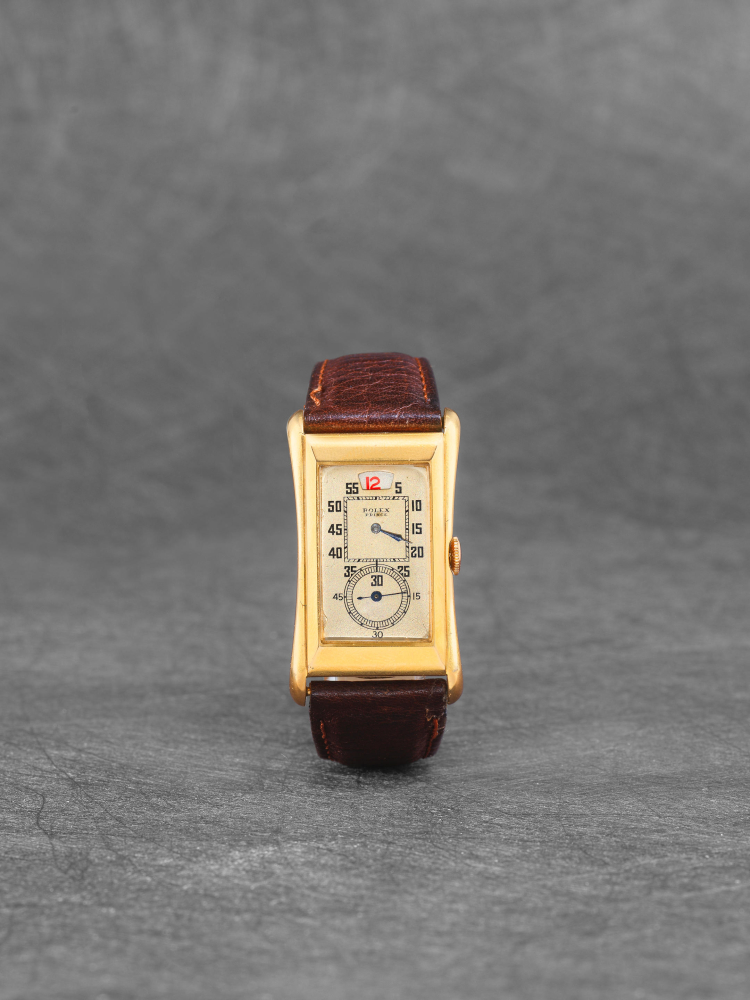 Rolex. A fine and rare 18K gold manual wind jump hour wristwatch
