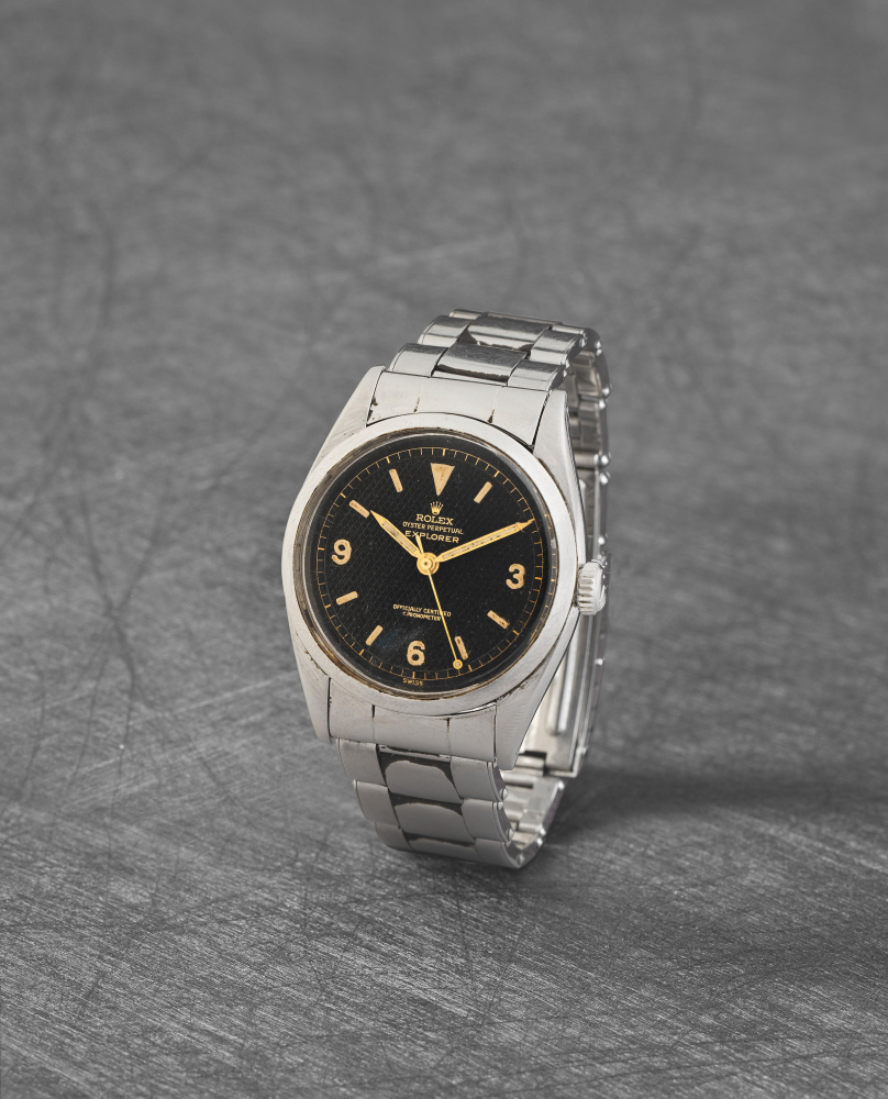 Rolex. A fine and rare stainless steel automatic bracelet watch with gilt honeycomb dial offered on behalf of the family of the original owner