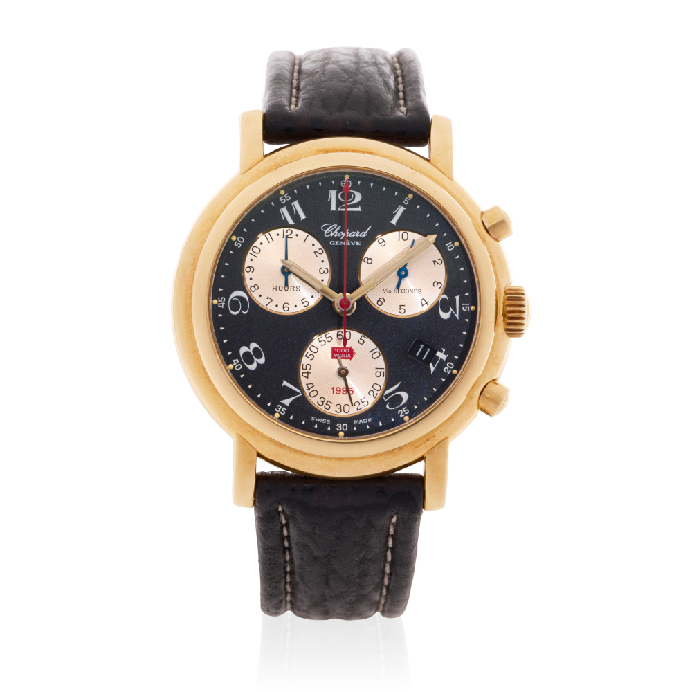 Chopard. An 18K gold quartz calendar chronograph wristwatch